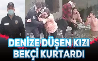 Denize düşen kızı suya atlayan bekçi kurtardı