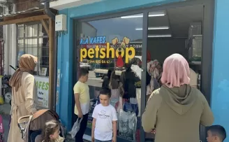Düzce’de karnesini getiren öğrencilere balık hediye edildi