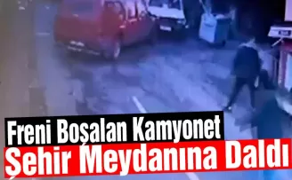 Freni boşalan kamyonet şehrin meydanına daldı