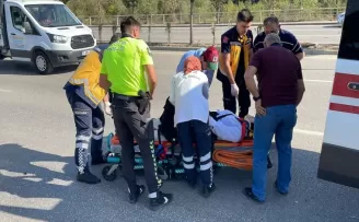 Karabük’te otomobile çarpan motosikletteki yolcu yaralandı