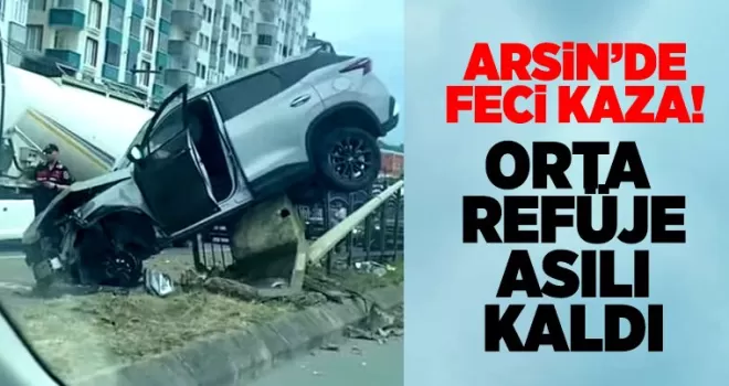 Arsin’de feci kaza! Orta refüjde asılı kaldı...