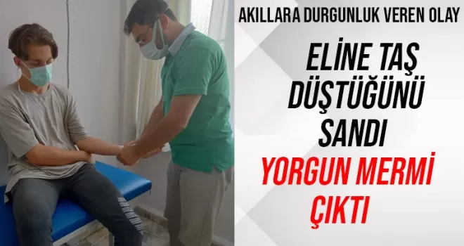 Eline taş düştüğünü sandı, yorgun mermi çıktı